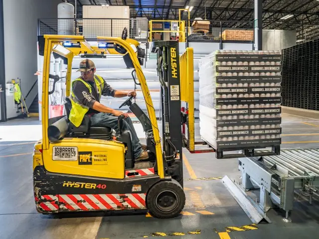 Warehouse worker operating a forklift